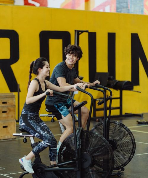 Woman feeling energetic and happy during a light cardio workout.